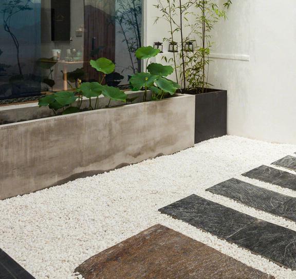 齐齐哈尔鹅卵石铺装庭院的工艺步骤（庭院鹅卵石铺设图案图片）